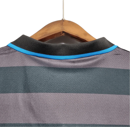 https://cdn.shopify.com/s/files/1/0826/7228/8075/files/19971998-inter-milan-pirelli-third-retro-kit-classickits433-620446.webp?v=1741198899