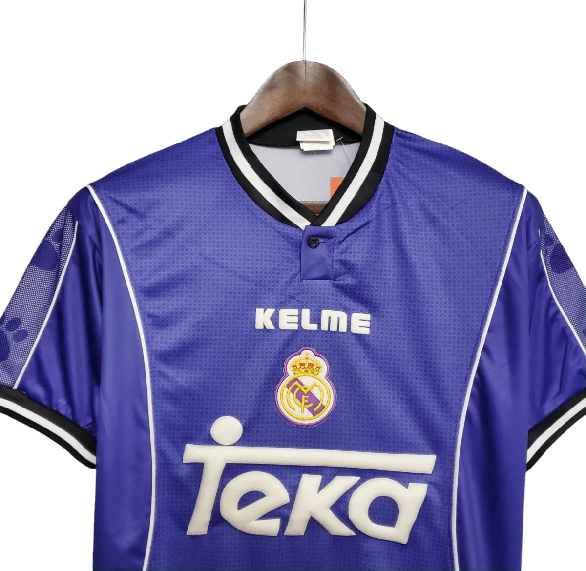 https://cdn.shopify.com/s/files/1/0826/7228/8075/files/19971998-real-madrid-teka-blue-away-retro-kit-classickits433-501073.webp?v=1741199032