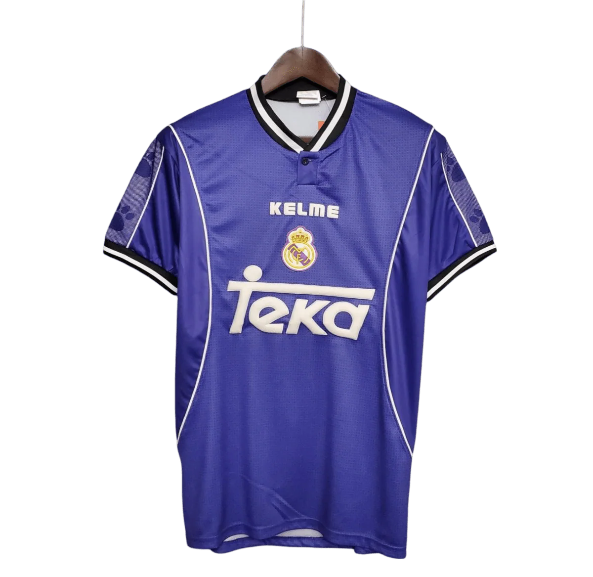 https://cdn.shopify.com/s/files/1/0826/7228/8075/files/19971998-real-madrid-teka-blue-away-retro-kit-classickits433-945680.webp?v=1741199033