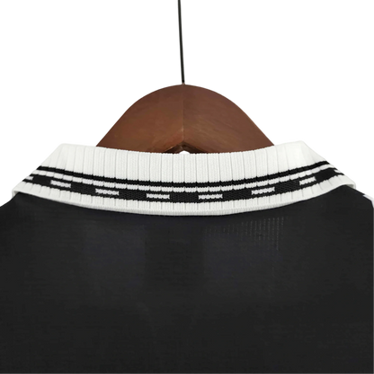 https://cdn.shopify.com/s/files/1/0826/7228/8075/files/19971998-real-madrid-teka-third-retro-kit-classickits433-420107.webp?v=1741199017