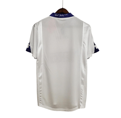 https://cdn.shopify.com/s/files/1/0826/7228/8075/files/19971998-real-madrid-teka-white-home-retro-kit-classickits433-257149.webp?v=1741199030