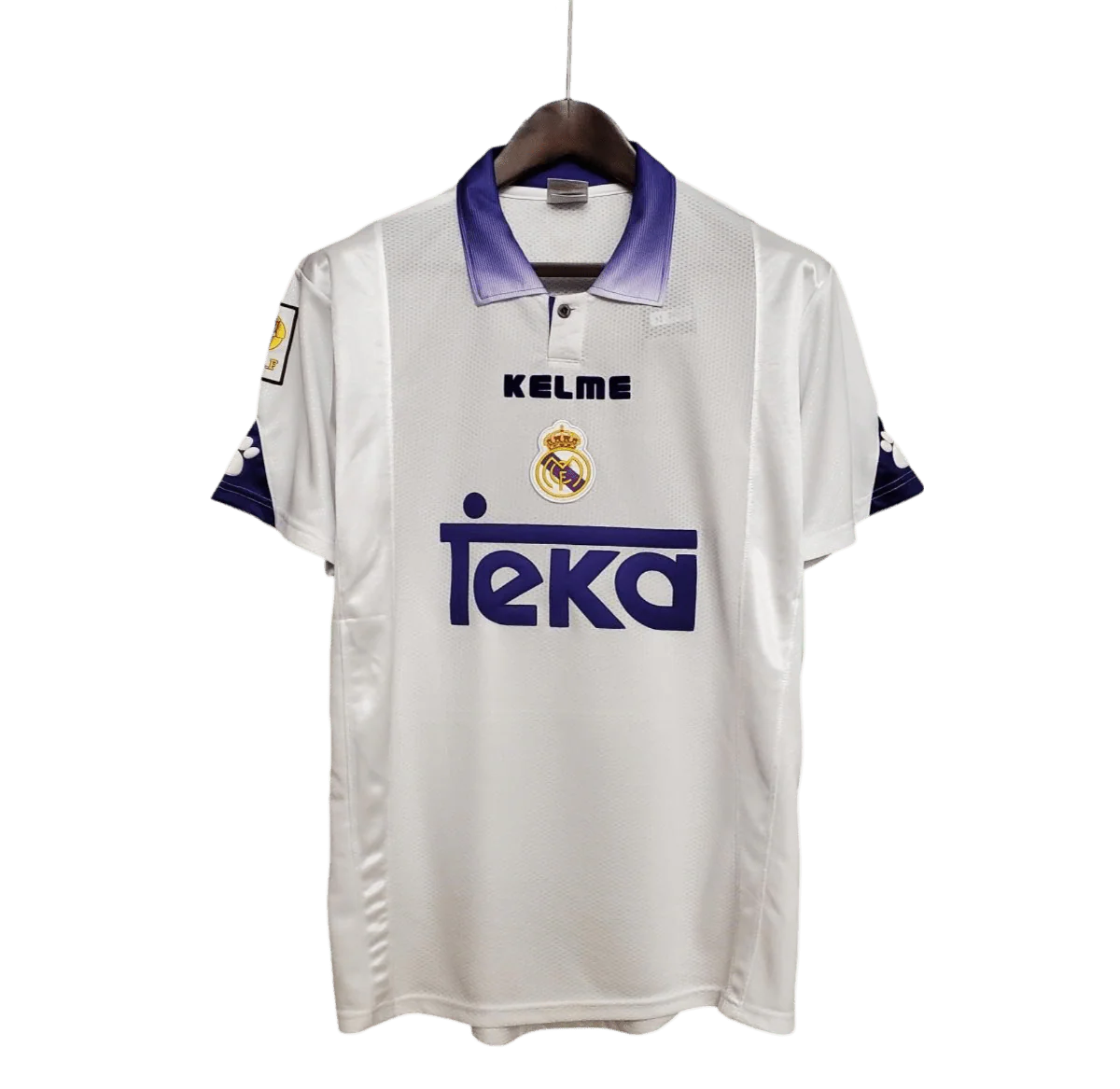 https://cdn.shopify.com/s/files/1/0826/7228/8075/files/19971998-real-madrid-teka-white-home-retro-kit-classickits433-385739.webp?v=1741199030