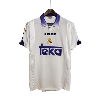https://cdn.shopify.com/s/files/1/0826/7228/8075/files/19971998-real-madrid-teka-white-home-retro-kit-classickits433-385739.webp?v=1741199030