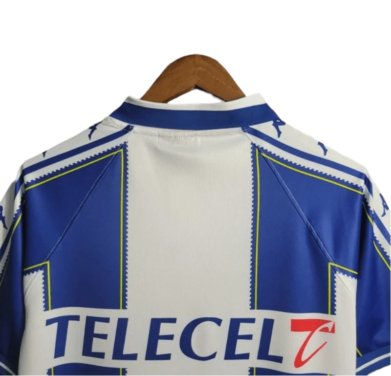https://cdn.shopify.com/s/files/1/0826/7228/8075/files/19971999-fc-porto-revigres-home-retro-jersey-629128.webp?v=1741199350