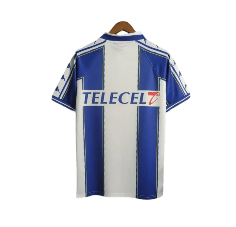 https://cdn.shopify.com/s/files/1/0826/7228/8075/files/19971999-fc-porto-revigres-home-retro-jersey-715048.webp?v=1741199349