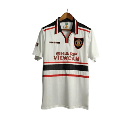 https://cdn.shopify.com/s/files/1/0826/7228/8075/files/19971999-manchester-united-sharp-viewcam-white-away-retro-kit-classickits433-823837.webp?v=1741199144
