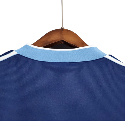 https://cdn.shopify.com/s/files/1/0826/7228/8075/files/1998-argentina-world-cup-away-retro-jersey-348715.webp?v=1741198526