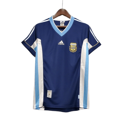 https://cdn.shopify.com/s/files/1/0826/7228/8075/files/1998-argentina-world-cup-away-retro-jersey-648974.webp?v=1741198526