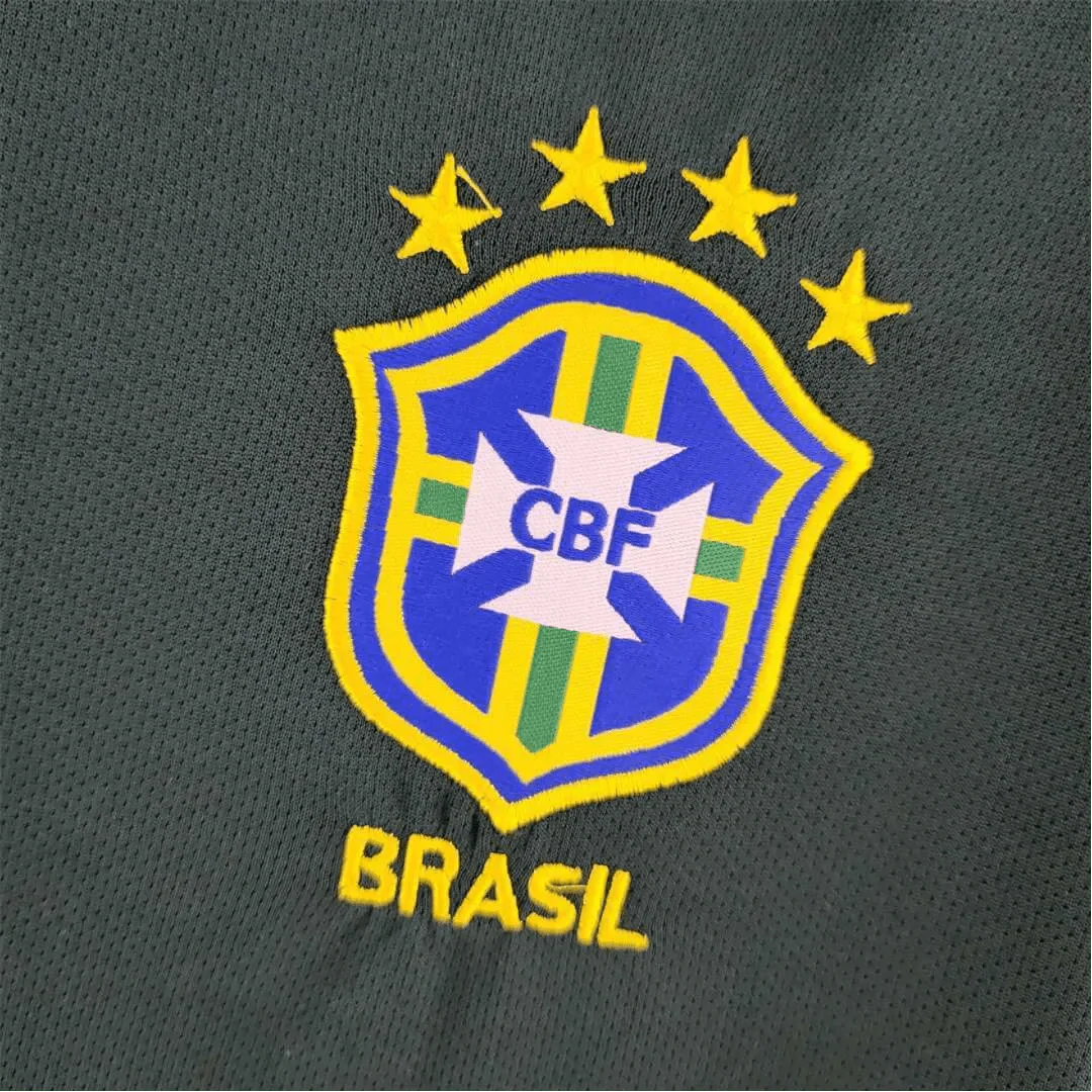 https://cdn.shopify.com/s/files/1/0826/7228/8075/files/1998-brazil-goalkeeper-dark-green-retro-kit-169228.webp?v=1741196953
