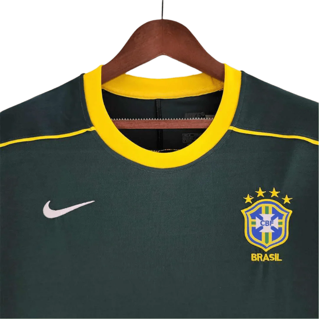https://cdn.shopify.com/s/files/1/0826/7228/8075/files/1998-brazil-goalkeeper-dark-green-retro-kit-315678.webp?v=1741196952