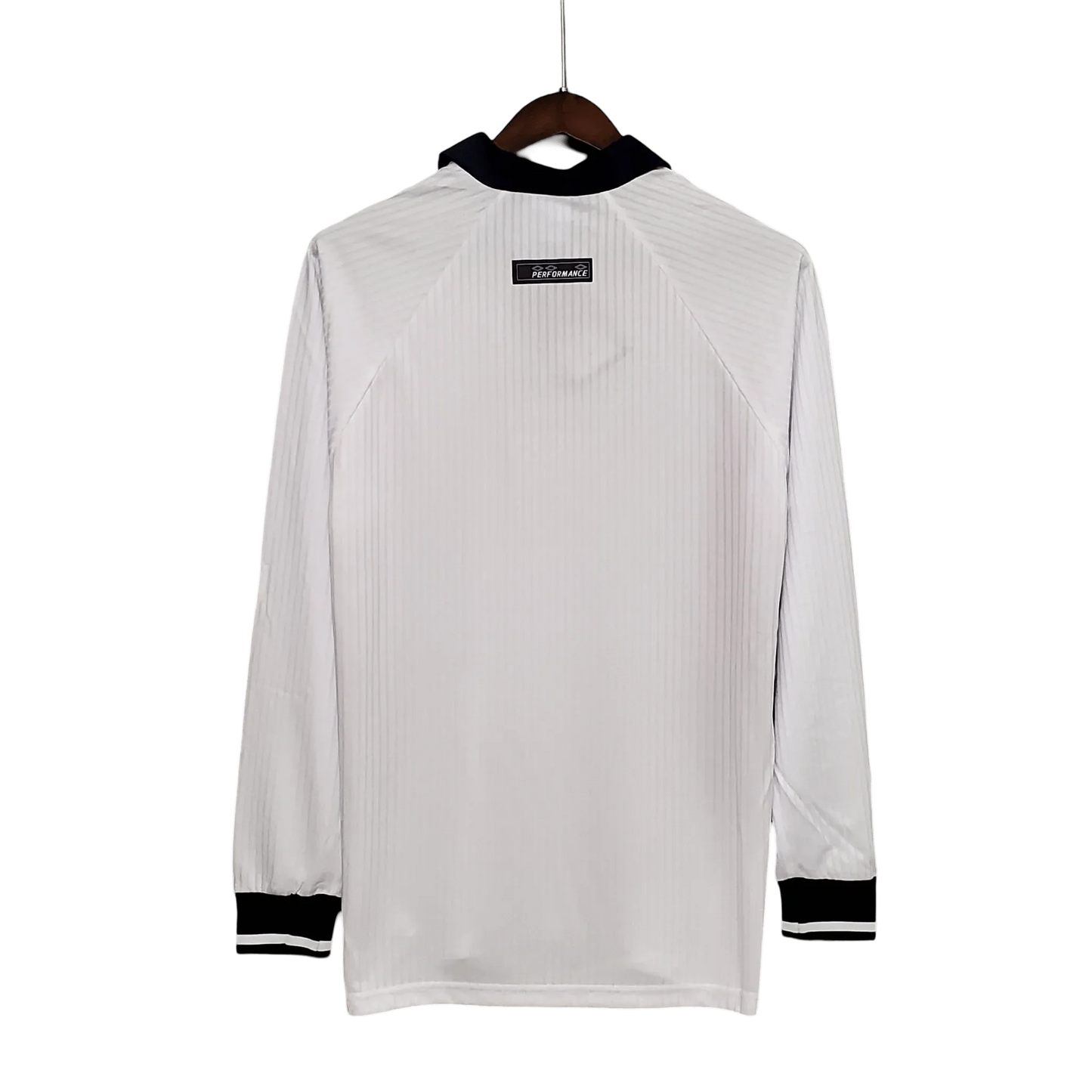 https://cdn.shopify.com/s/files/1/0826/7228/8075/files/1998-england-home-retro-kit-long-sleeves-678683.webp?v=1741197040