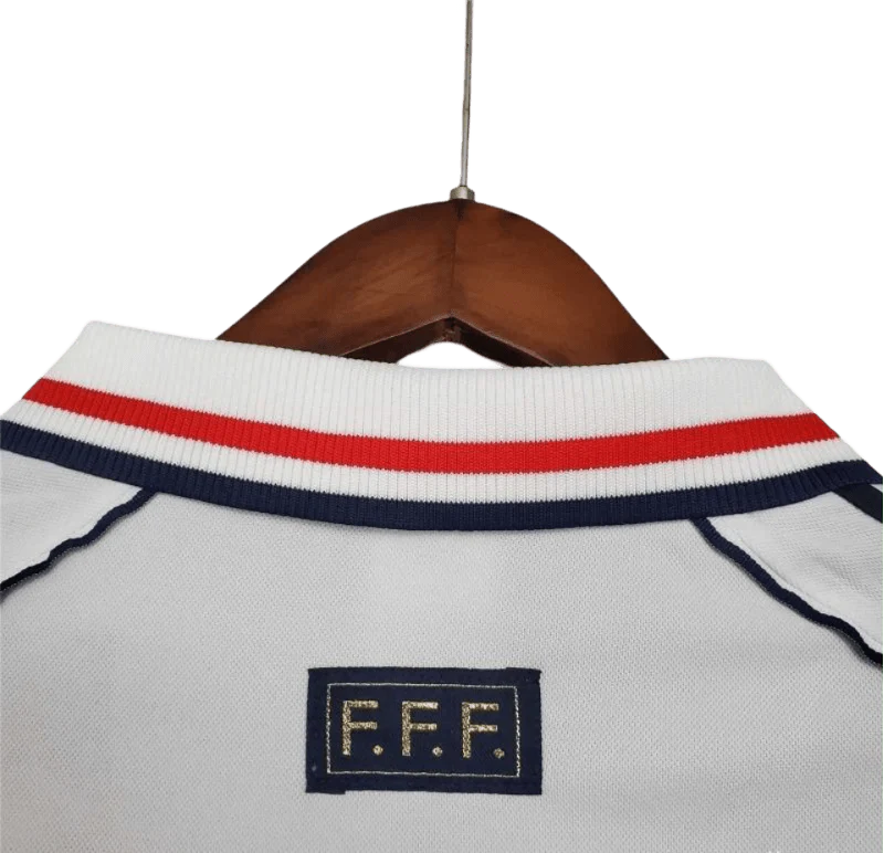 https://cdn.shopify.com/s/files/1/0826/7228/8075/files/1998-france-world-cup-away-retro-jersey-249546.webp?v=1741198517