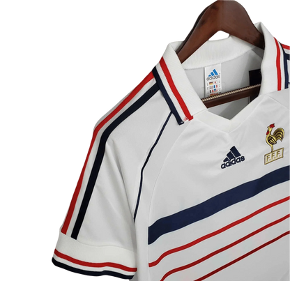 https://cdn.shopify.com/s/files/1/0826/7228/8075/files/1998-france-world-cup-away-retro-jersey-251519.webp?v=1741198519