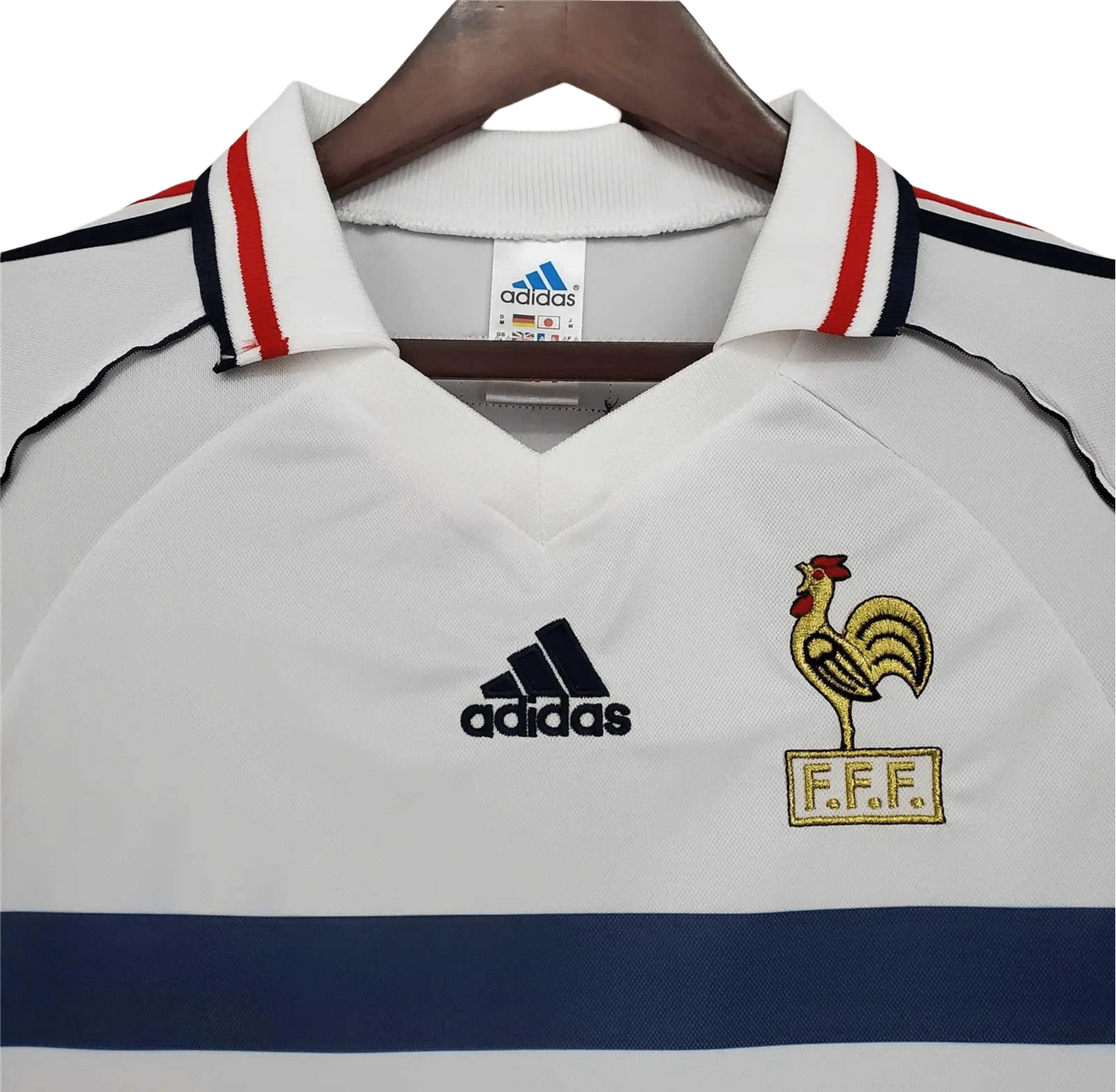 https://cdn.shopify.com/s/files/1/0826/7228/8075/files/1998-france-world-cup-away-retro-jersey-474461.webp?v=1741198519