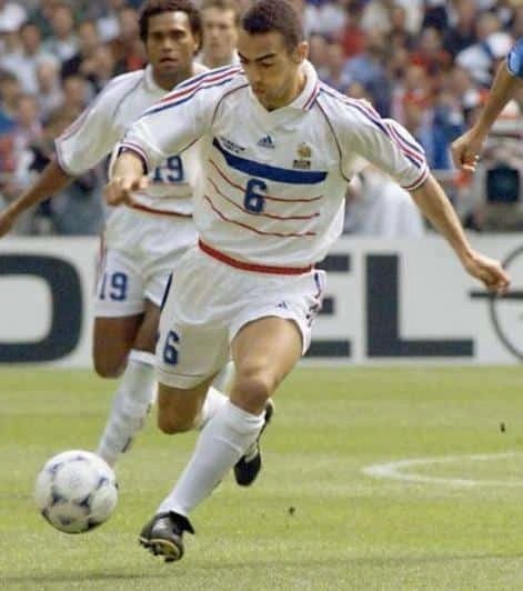 https://cdn.shopify.com/s/files/1/0826/7228/8075/files/1998-france-world-cup-away-retro-jersey-836959.webp?v=1741198519