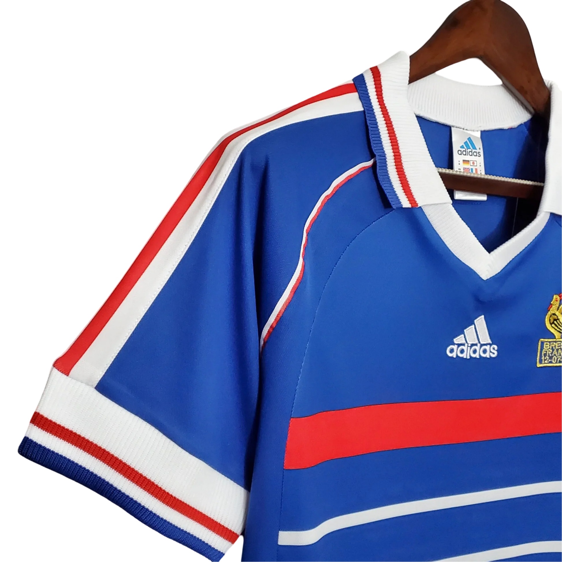 https://cdn.shopify.com/s/files/1/0826/7228/8075/files/1998-france-world-cup-home-retro-jersey-144160.webp?v=1741198760