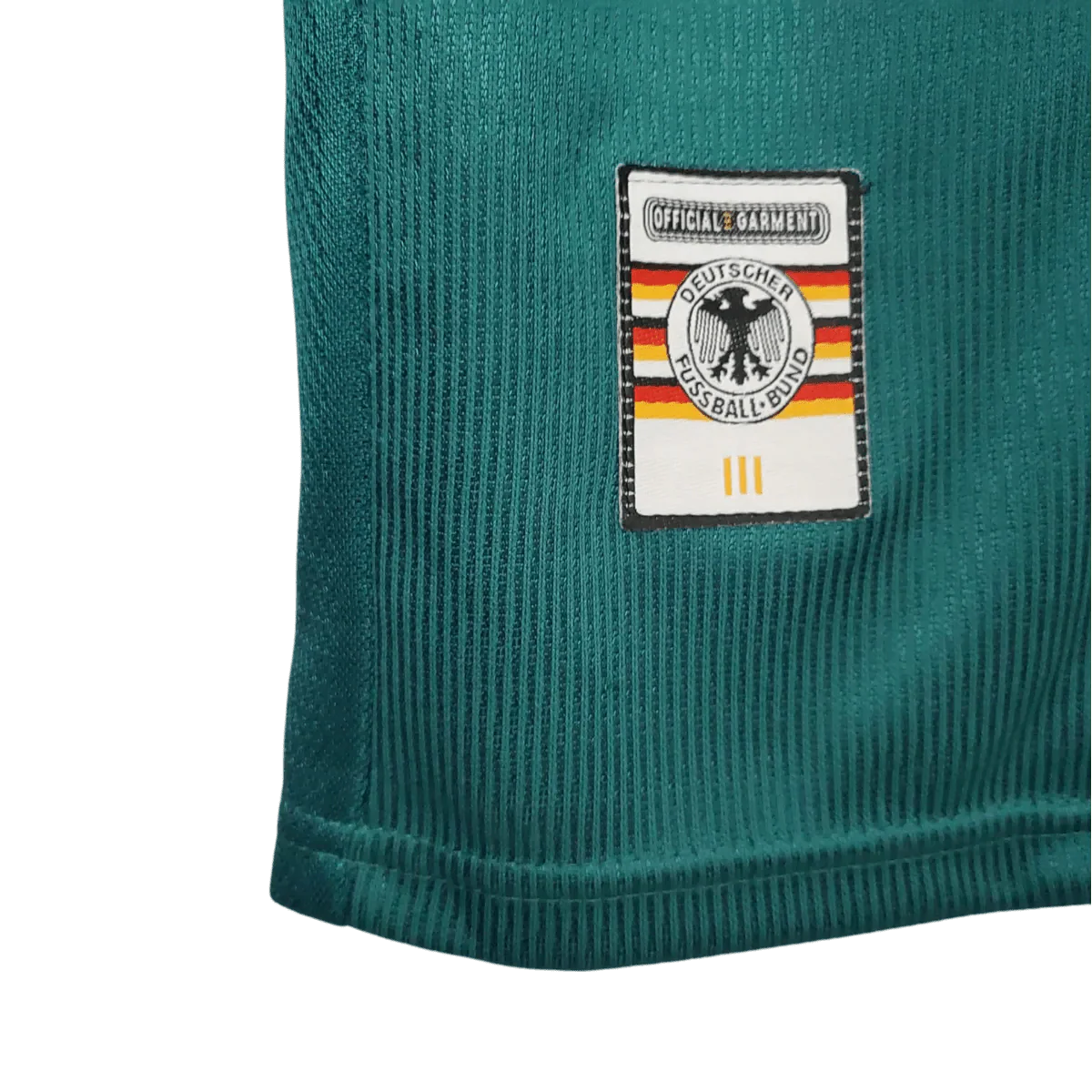 https://cdn.shopify.com/s/files/1/0826/7228/8075/files/1998-germany-away-retro-kit-165439.webp?v=1741197026