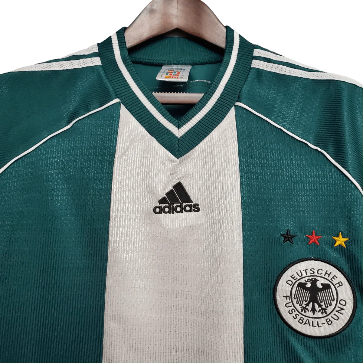 https://cdn.shopify.com/s/files/1/0826/7228/8075/files/1998-germany-away-retro-kit-611186.webp?v=1741197027