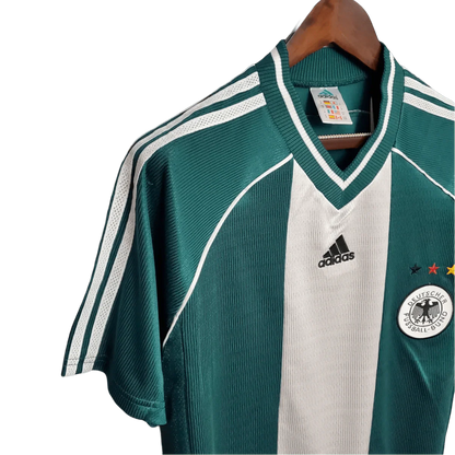 https://cdn.shopify.com/s/files/1/0826/7228/8075/files/1998-germany-away-retro-kit-887272.webp?v=1741197027