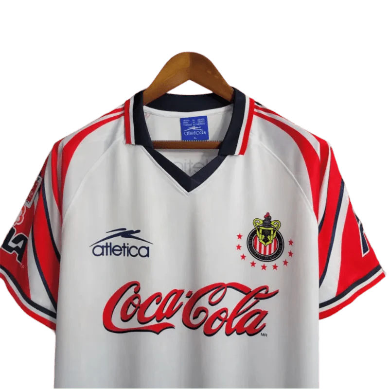 https://cdn.shopify.com/s/files/1/0826/7228/8075/files/19981998-chivas-guadalajara-cocacola-away-retro-jersey-690094.webp?v=1741197165
