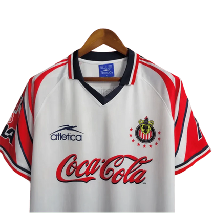 https://cdn.shopify.com/s/files/1/0826/7228/8075/files/19981998-chivas-guadalajara-cocacola-away-retro-jersey-690094.webp?v=1741197165
