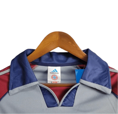 https://cdn.shopify.com/s/files/1/0826/7228/8075/files/19981999-bayern-munich-opel-third-retro-kit-classickits433-449543.webp?v=1741199349