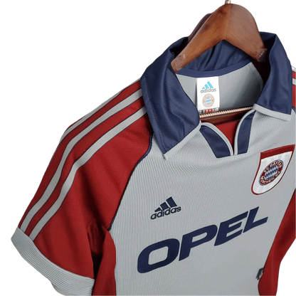 https://cdn.shopify.com/s/files/1/0826/7228/8075/files/19981999-bayern-munich-opel-third-retro-kit-classickits433-642238.webp?v=1741199352