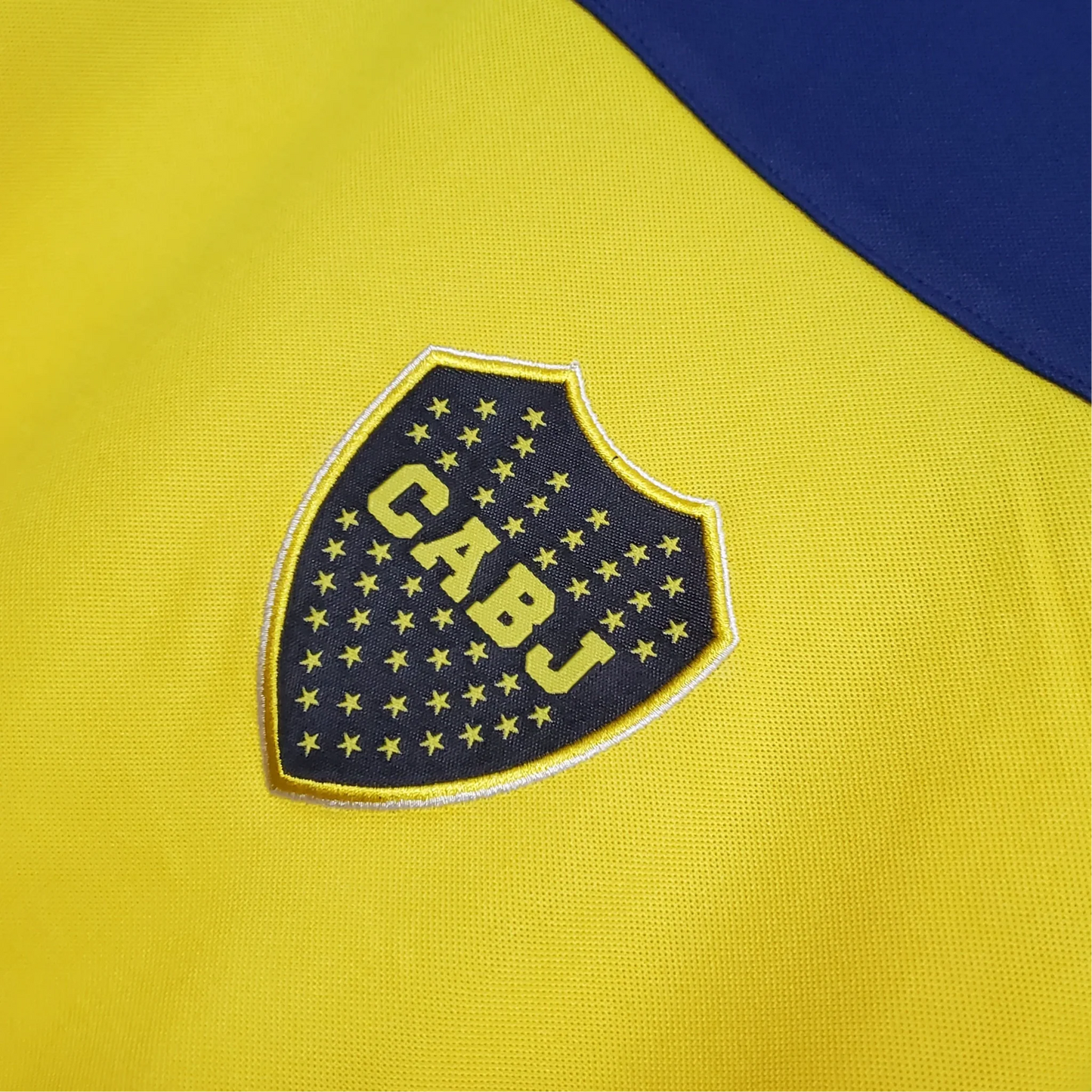 https://cdn.shopify.com/s/files/1/0826/7228/8075/files/19981999-boca-juniors-quilmes-home-retro-jersey-199954.webp?v=1741197208