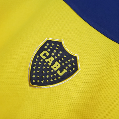 https://cdn.shopify.com/s/files/1/0826/7228/8075/files/19981999-boca-juniors-quilmes-home-retro-jersey-199954.webp?v=1741197208