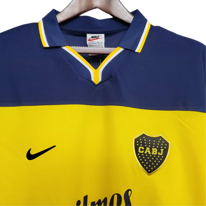 https://cdn.shopify.com/s/files/1/0826/7228/8075/files/19981999-boca-juniors-quilmes-home-retro-jersey-737371.webp?v=1741197208