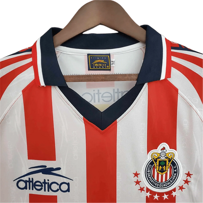 https://cdn.shopify.com/s/files/1/0826/7228/8075/files/19981999-chivas-guadalajara-coca-cola-home-retro-jersey-749418.webp?v=1741197187