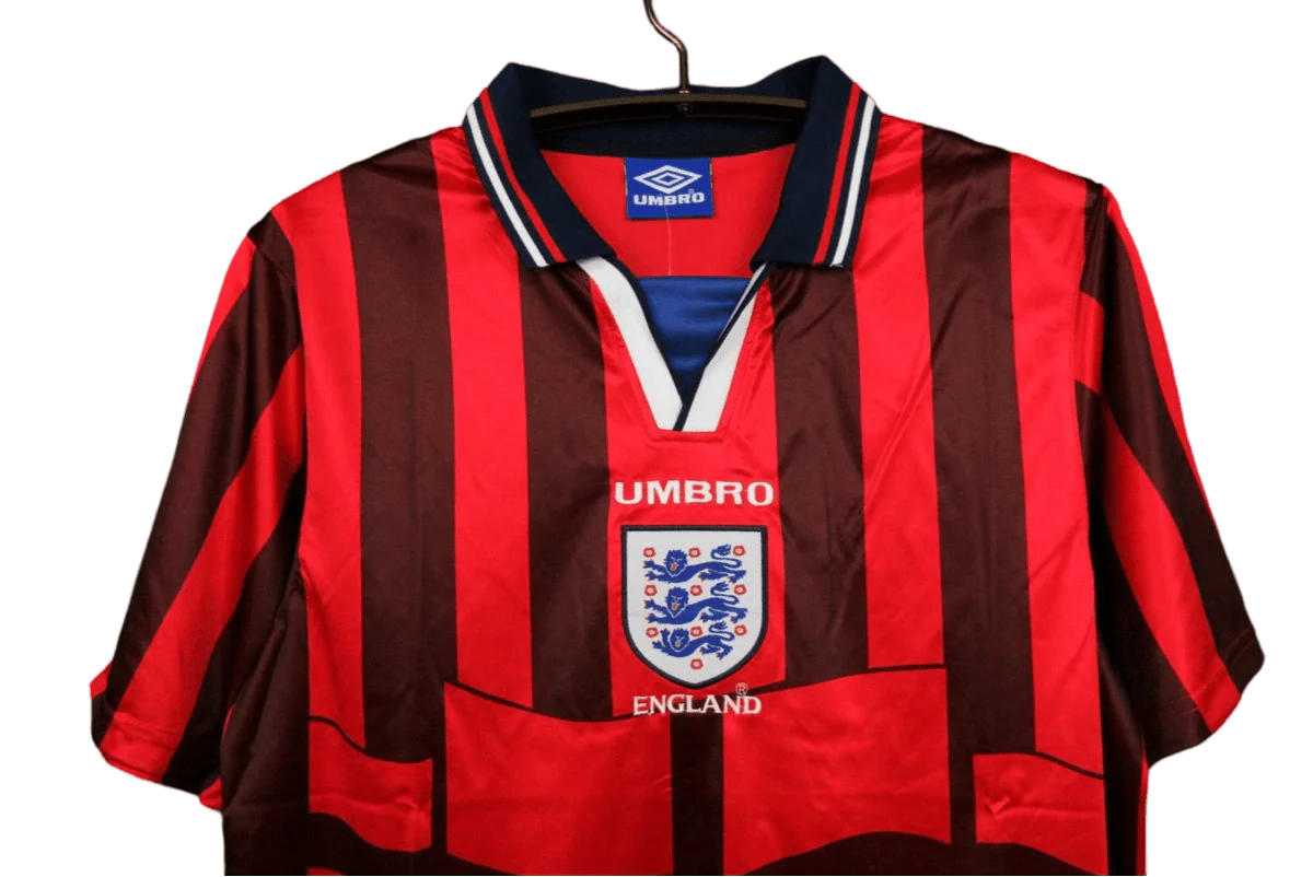 https://cdn.shopify.com/s/files/1/0826/7228/8075/files/19981999-england-away-retro-kit-classickits433-848864.webp?v=1741198459