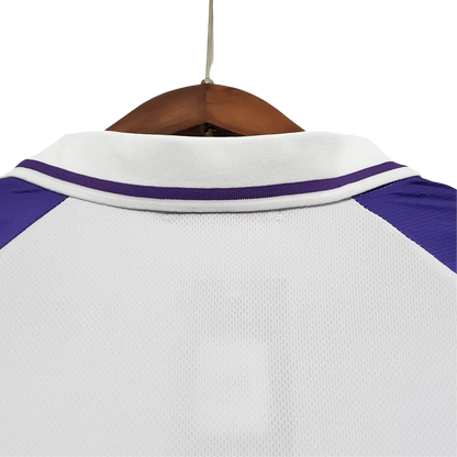 https://cdn.shopify.com/s/files/1/0826/7228/8075/files/19981999-fiorentina-florence-nintendo-fila-away-retro-kit-classickits433-676033.webp?v=1741199024