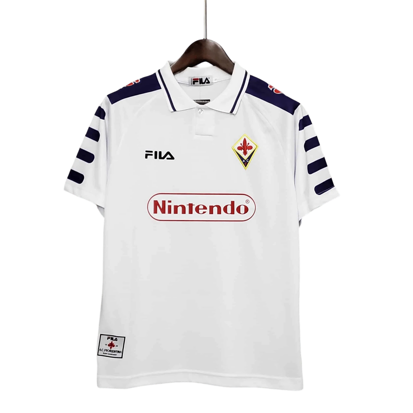https://cdn.shopify.com/s/files/1/0826/7228/8075/files/19981999-fiorentina-florence-nintendo-fila-away-retro-kit-classickits433-772787.webp?v=1741199024