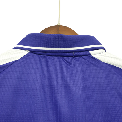 https://cdn.shopify.com/s/files/1/0826/7228/8075/files/19981999-fiorentina-florence-nintendo-fila-home-retro-kit-classickits433-722060.webp?v=1741199047