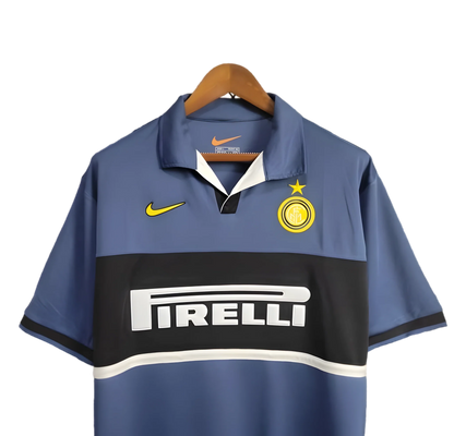 https://cdn.shopify.com/s/files/1/0826/7228/8075/files/19981999-inter-milan-pirelli-third-blue-retro-kit-classickits433-972237.webp?v=1741198872