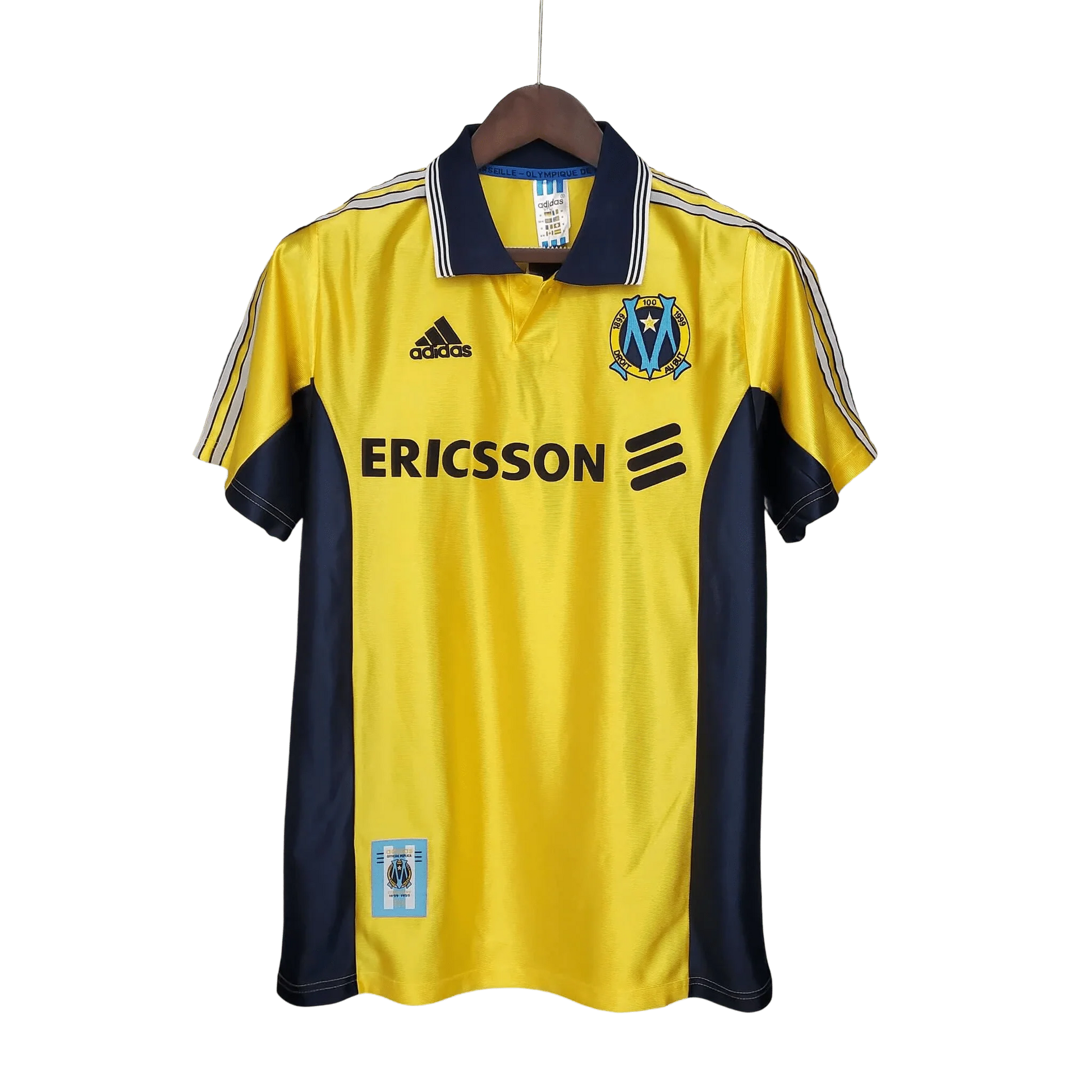 https://cdn.shopify.com/s/files/1/0826/7228/8075/files/19981999-olympique-de-marseille-ericsson-away-retro-jersey-387343.webp?v=1741199398