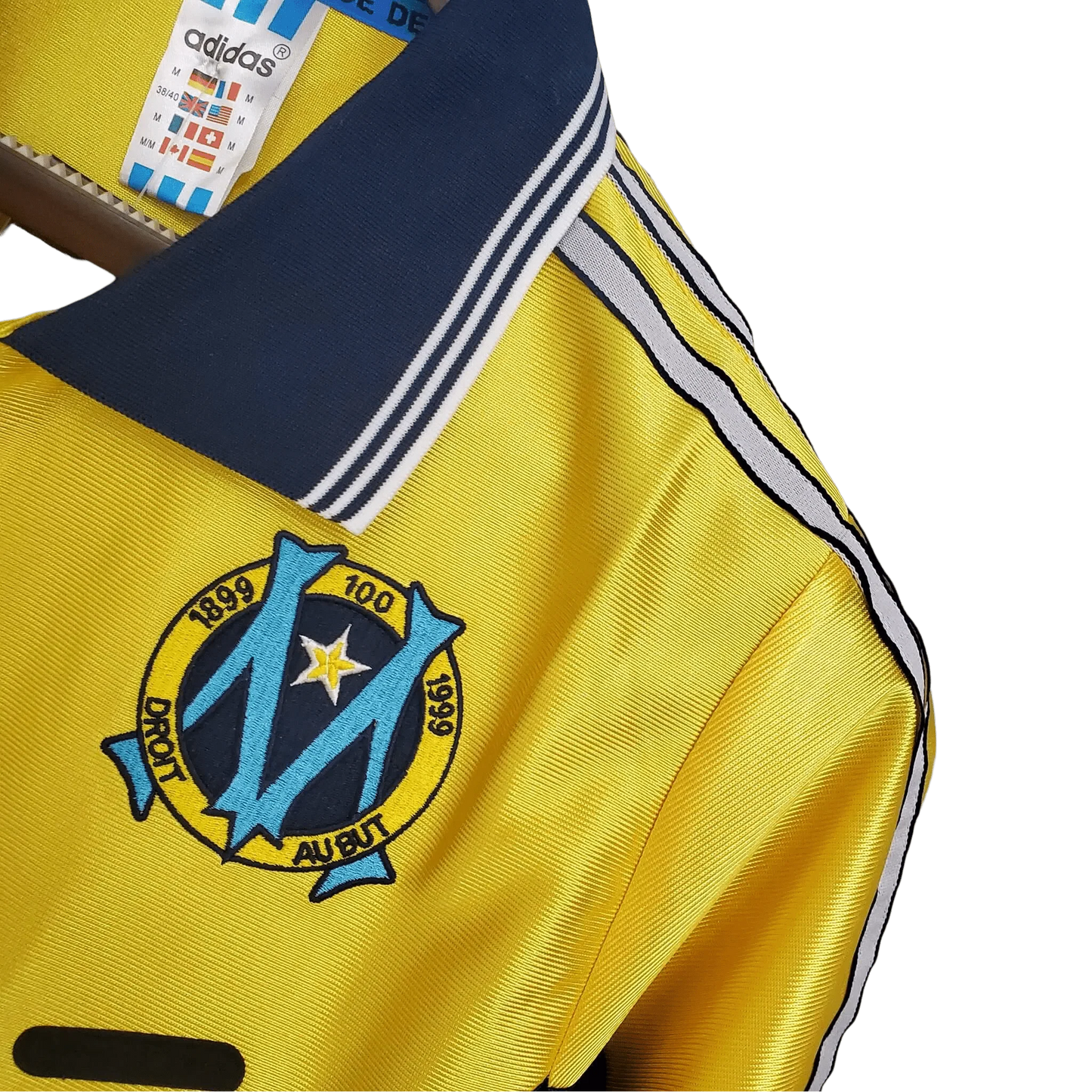 https://cdn.shopify.com/s/files/1/0826/7228/8075/files/19981999-olympique-de-marseille-ericsson-away-retro-jersey-691650.webp?v=1741199400