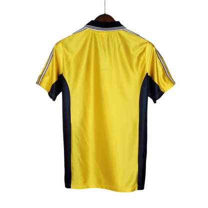 https://cdn.shopify.com/s/files/1/0826/7228/8075/files/19981999-olympique-de-marseille-ericsson-away-retro-jersey-744450.webp?v=1741199401