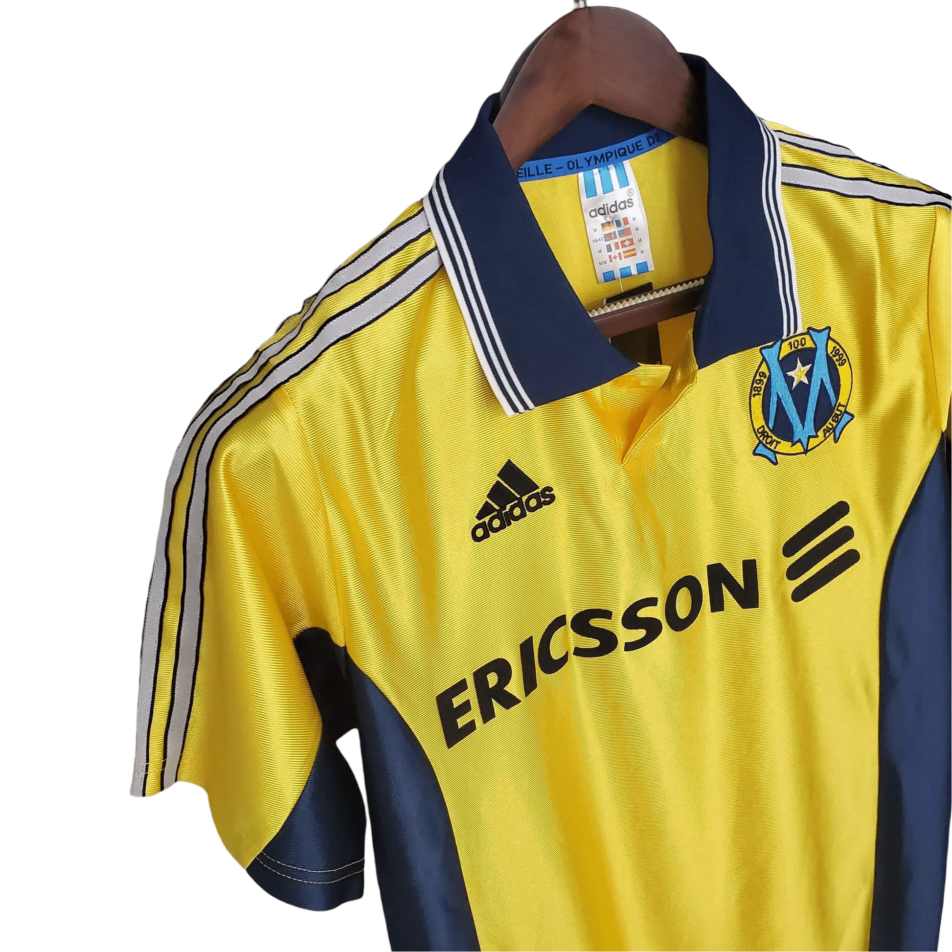 https://cdn.shopify.com/s/files/1/0826/7228/8075/files/19981999-olympique-de-marseille-ericsson-away-retro-jersey-782980.webp?v=1741199403