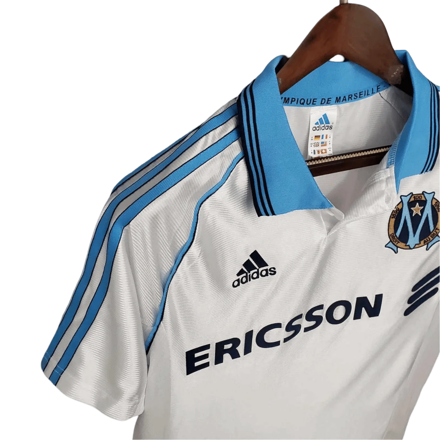 https://cdn.shopify.com/s/files/1/0826/7228/8075/files/19981999-olympique-de-marseille-ericsson-home-retro-jersey-732281.webp?v=1741199415