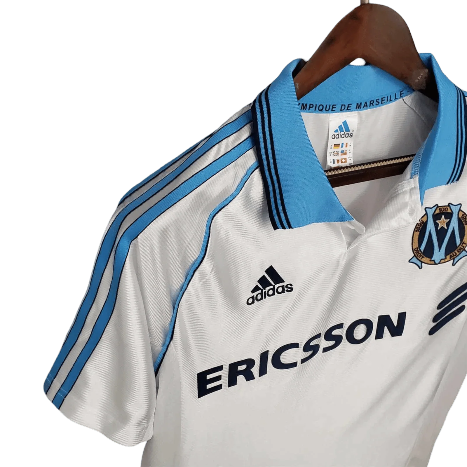 https://cdn.shopify.com/s/files/1/0826/7228/8075/files/19981999-olympique-de-marseille-ericsson-home-retro-jersey-732281.webp?v=1741199415