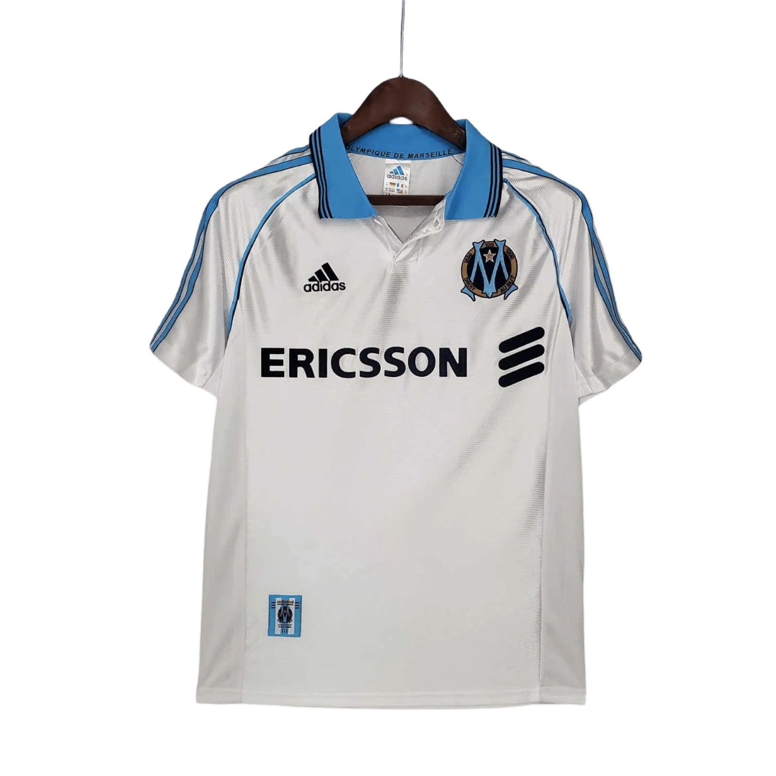 https://cdn.shopify.com/s/files/1/0826/7228/8075/files/19981999-olympique-de-marseille-ericsson-home-retro-jersey-802130.webp?v=1741199413