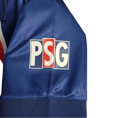 https://cdn.shopify.com/s/files/1/0826/7228/8075/files/19981999-paris-saint-germain-opel-home-retro-jersey-255846.webp?v=1741199394