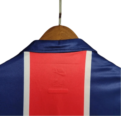 https://cdn.shopify.com/s/files/1/0826/7228/8075/files/19981999-paris-saint-germain-opel-home-retro-jersey-327674.webp?v=1741199392
