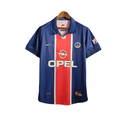 https://cdn.shopify.com/s/files/1/0826/7228/8075/files/19981999-paris-saint-germain-opel-home-retro-jersey-495631.webp?v=1741199394