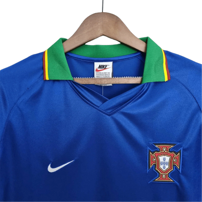 https://cdn.shopify.com/s/files/1/0826/7228/8075/files/19981999-portugal-away-retro-jersey-465081.webp?v=1741198524