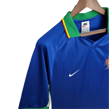 https://cdn.shopify.com/s/files/1/0826/7228/8075/files/19981999-portugal-away-retro-jersey-656224.webp?v=1741198525
