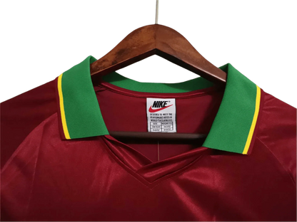 https://cdn.shopify.com/s/files/1/0826/7228/8075/files/19981999-portugal-home-retro-jersey-372392.webp?v=1741198515