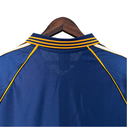 https://cdn.shopify.com/s/files/1/0826/7228/8075/files/19981999-real-madrid-teka-blue-third-retro-kit-classickits433-633068.webp?v=1741199020